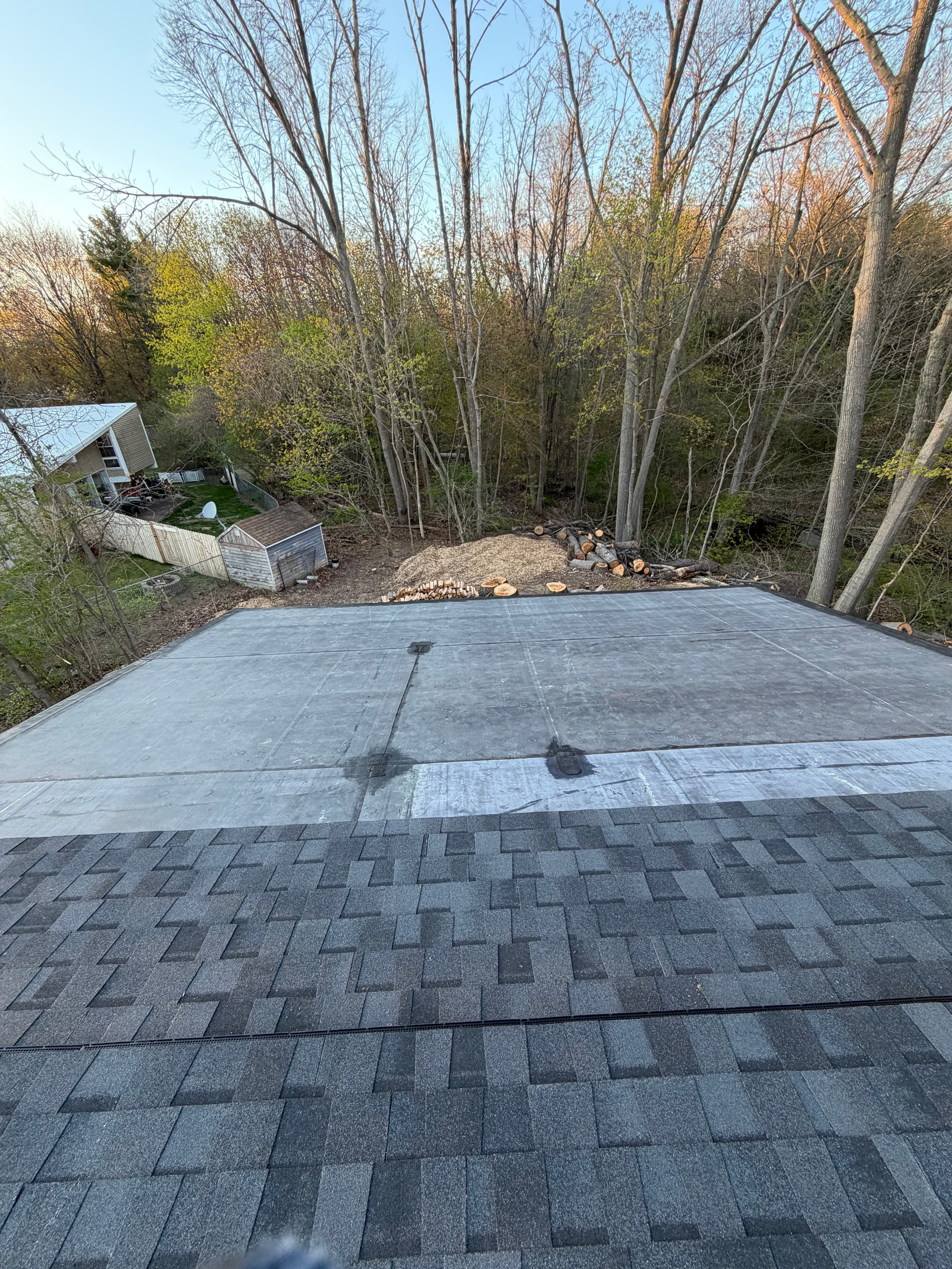 Residential EPDM low-slope roofing installed by Almighty Contracting