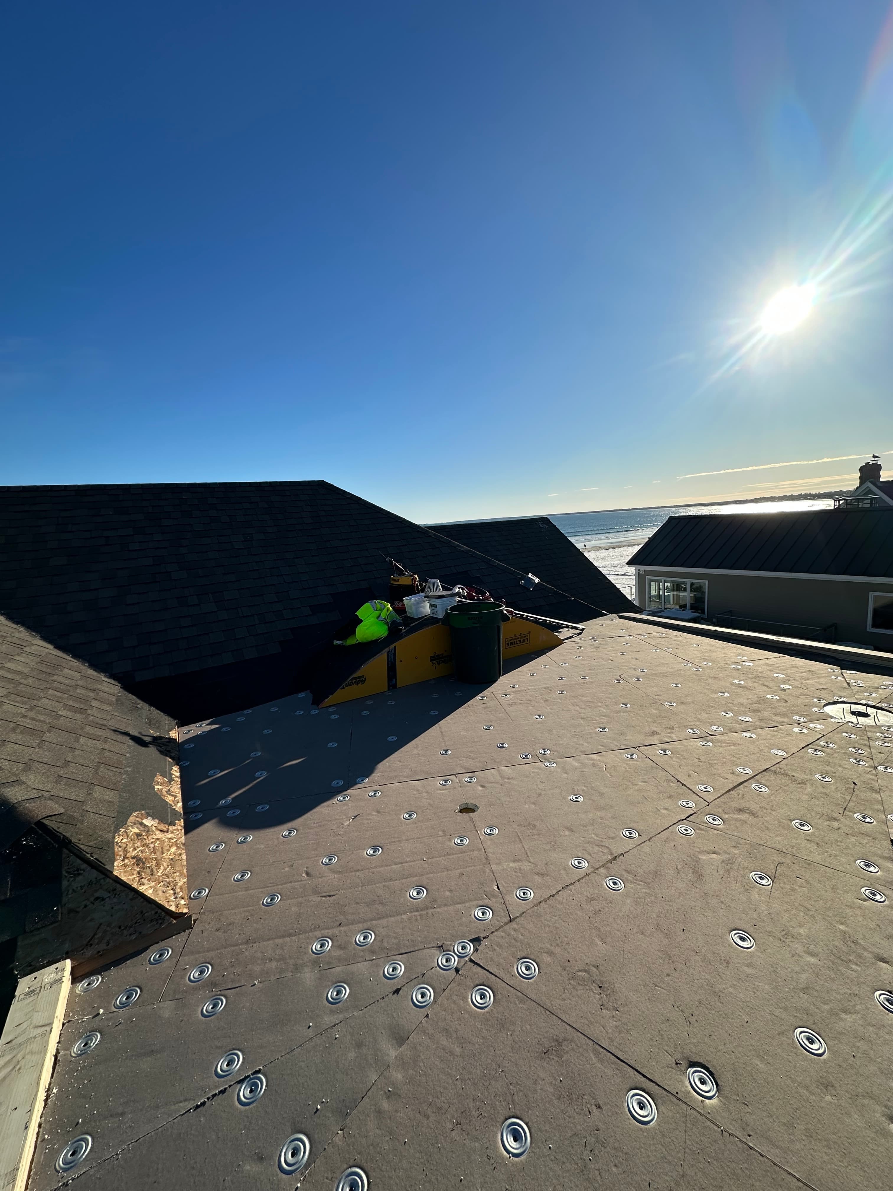 Tapered insulation and low-slope roofing assembly